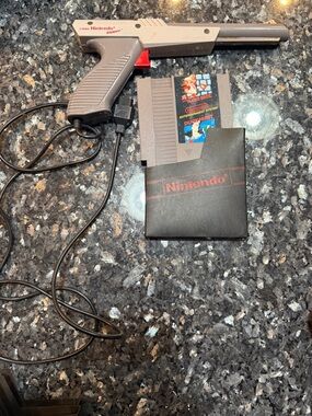 Nintendo Gray Zapper Light Gun with Gray NES Cartridge and Black Sleeve